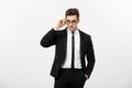Business Concept: Portrait handsome young businessman wearing glasses isolated over white background Royalty Free Stock Photo