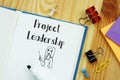 Business concept about Project Leadership with phrase on the sheet