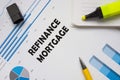 Business concept about REFINANCE MORTGAGE with sign on the page
