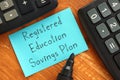 Business concept about Registered Education Savings Plan RESP with sign on the page Royalty Free Stock Photo