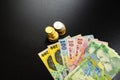 Business concept, Romanian currency on black table. LEI banknotes, and coins