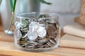 Business concept, saving planning with coins in glass jar