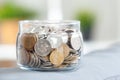 Business concept, saving planning with coins in glass jar