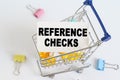 In the shopping cart, the text is written on the card - REFERENCE CHECKS