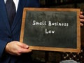 Business concept about Small Business Law with phrase on chalkboard Royalty Free Stock Photo