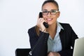 Business concept - smiling woman with laptop, documents and telephone in office. on white background Royalty Free Stock Photo