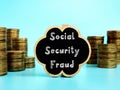 Business concept about Social Security Fraud with sign on the piece of paper Royalty Free Stock Photo