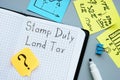 Business concept about Stamp Duty Land Tax SDLT with phrase on the sheet