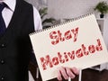 Business concept about Stay Motivated with inscription on the sheet Royalty Free Stock Photo