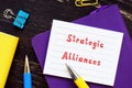 Business concept about Strategic Alliances with inscription on the piece of paper