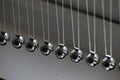 Business concept for strategy team work and alignment. Newtons Cradle Pendulum Royalty Free Stock Photo