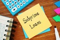 Business concept about Subprime Loans with sign on the sheet