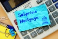 Business concept about Subprime Mortgage with sign on the page