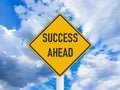 Business concept success ahead road sign on blue cloudy sky Royalty Free Stock Photo