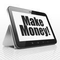 Business concept: Tablet Computer with Make Money! on display Royalty Free Stock Photo