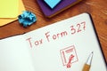 Business concept about Tax Form 327 with inscription on the sheet