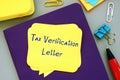 Business concept about Tax Verification Letter with sign on the sheet Royalty Free Stock Photo