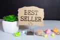 Business concept. Text BEST SELLER on a paper clipboard with,pencil Royalty Free Stock Photo