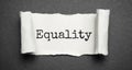 Business concept. The text equality on white torn paper Royalty Free Stock Photo