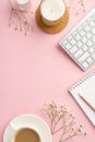 Business concept. Top view vertical photo of workplace keyboard reminder pencil cup of coffee on saucer candles rattan placemat Royalty Free Stock Photo