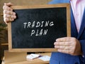 Business concept about TRADING PLAN with inscription on the chalkboard Royalty Free Stock Photo
