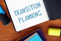 Business concept about TRANSITION PLANNING exclamation marks with phrase on the page