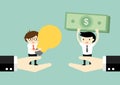 Business concept. Two businessmen standing on big hands exchanging money for idea.