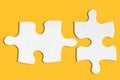 Business concept. Two matching puzzle pieces. Metaphor of partnership, teamwork, problem solution, support, success Royalty Free Stock Photo