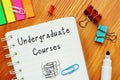 Business concept about Undergraduate Courses with phrase on the page