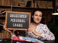 Business concept about UNSECURED PERSONAL LOANS with inscription on the chalkboard