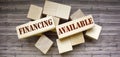 wooden background blocks with the text Financing Available