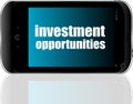 Business concept. words investment opportunities . Detailed modern smartphone Royalty Free Stock Photo