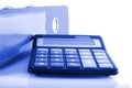 Business concepts clip folders and calculator