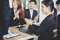 Business congratulation.asian business people team applauding in the meeting after finish project presentation Royalty Free Stock Photo