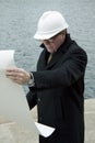 Business construction man ingineer architect on the work site overlooking project at waterfront Royalty Free Stock Photo