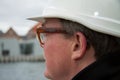 Business construction man ingineer architect on the work site overlooking project at waterfront Royalty Free Stock Photo