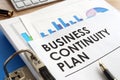 Business continuity plan in a folder. Royalty Free Stock Photo