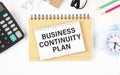 BUSINESS CONTINUITY PLAN, text on white paper Royalty Free Stock Photo