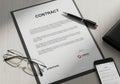 Business contract document with pen glasses and smartphone Royalty Free Stock Photo
