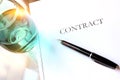 Business contract with pen is ready to sign. A glass of water Royalty Free Stock Photo