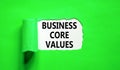 Business core values symbol. Concept words Business core values on beautiful white paper. Beautiful green background. Business