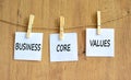 Business core values symbol. Concept words Business core values on beautiful white paper on clothespin. Beautiful wooden Royalty Free Stock Photo
