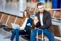 Business couple at the airport Royalty Free Stock Photo