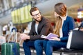 Business couple at the airport Royalty Free Stock Photo