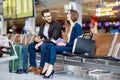 Business couple at the airport Royalty Free Stock Photo