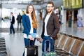 Business couple at the airport Royalty Free Stock Photo