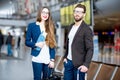 Business couple at the airport Royalty Free Stock Photo