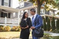 Business Couple With Baby Son Leaving House For Work Royalty Free Stock Photo