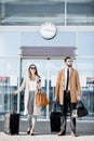 Business couple near the airport Royalty Free Stock Photo