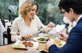 Business couple having dinner together Royalty Free Stock Photo
